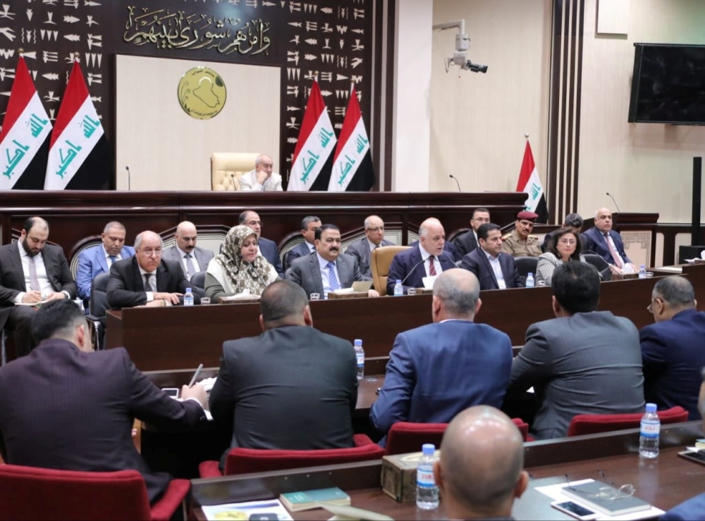 Iraqi Prime Minister Haider al-Abadi attends a session at the parliament headquarters, in Baghdad, September 8, 2018. Iraqi Prime Minister Office 
