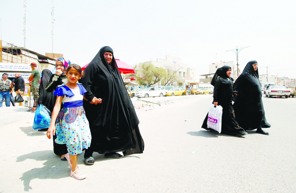 Iraqi women walk in the street after a week of violent protests in Basra, Iraq September 9, 2018. Reuters/Essam al-Sudani