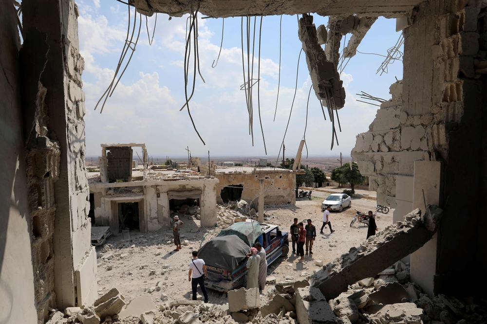 The destructions after government forces' bombings in the town of Al Habit on the southern edges of the rebel-held Idlib province on September 9, 2018.  AFP / OMAR HAJ KADOUR
