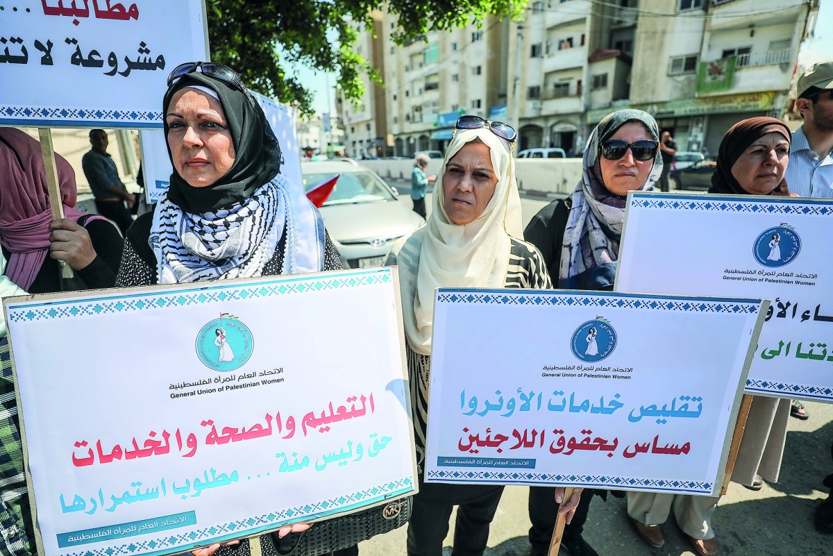 Palestinians stage a protest against US decision to cut funding to the United Nations Relief and Works Agency for Palestine Refugees in Gaza City, Gaza on September 4, 2018. (Mustafa Hassona/Anadolu Agency)