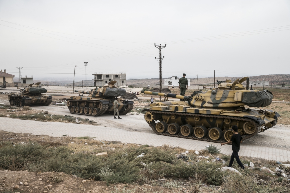 Tanks belonging to Turkish Armed Forces' are being dispatched to support the units at the border in Reyhanli district of Hatay, Turkey on September 13, 2018. Cem Genco - Anadolu

