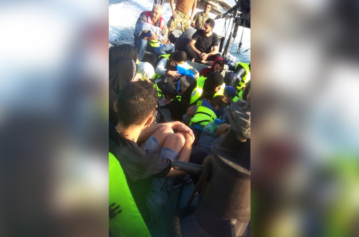 Lebanon's navy rescuing dozens of people, including Syrians, from a sinking boat off the country's northern coastal town of Sheikh Zinad, in the Akkar province.  AFP / Lebanese Army Website / ANWAR AMRO