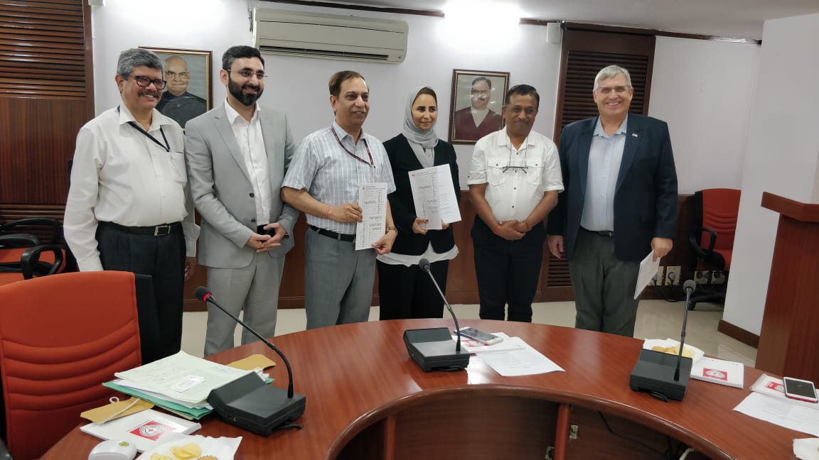 QRCS officials with representatives of IRCS and IFRC after signing an MoU. 