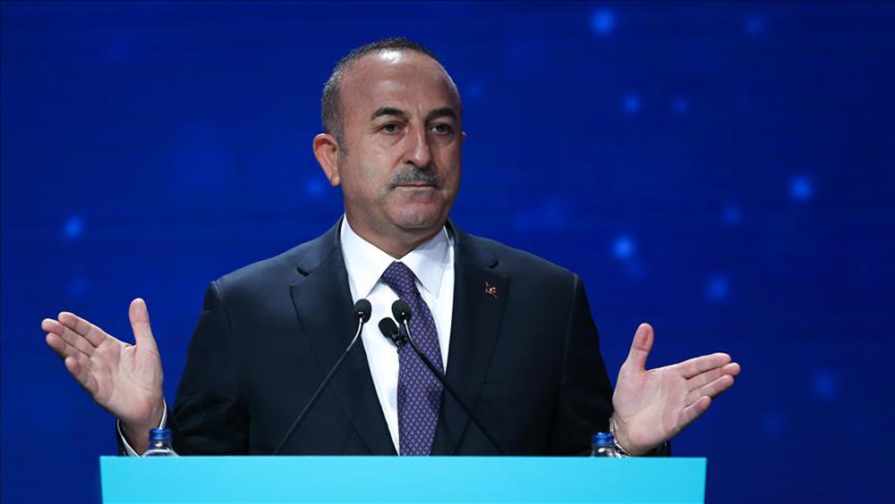 Turkish Foreign Minister Mevlut Cavusoglu speaks during a panel discussion titled; 