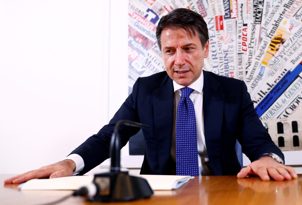 Italian Prime Minister Giuseppe Conte holds a news conference in Rome, Italy, October 22, 2018. REUTERS/Max Rossi