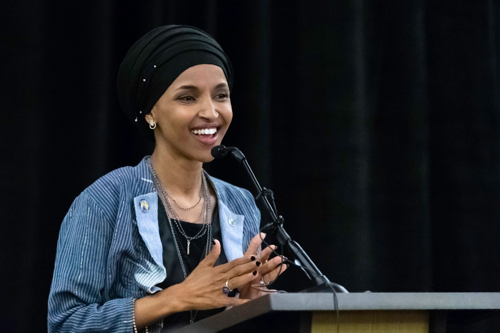 Ilhan Omar, newly elected to the U.S. House of Representatives on the Democratic ticket, speaks to a group of supporters in Minneapolis, Minnesota on November 6, 2018. AFP / Kerem Yucel 