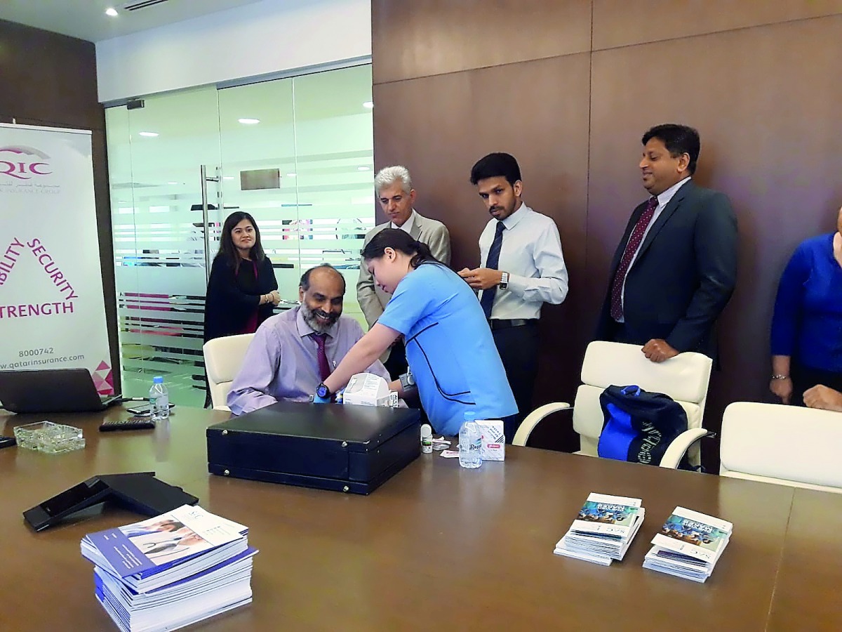 QIC’s staff undergoing a medical check-up. 