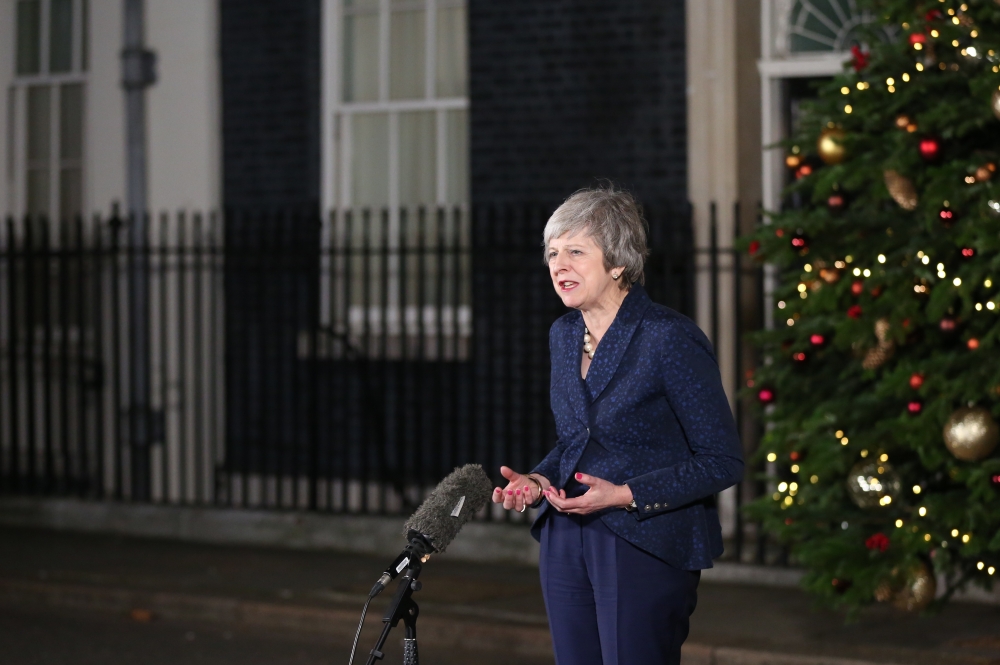 British Prime Minister Theresa May makes a statement outside Number 10 Downing Street after winning the confidence vote on December 12, 2018 in London, England. (Tayfun Salc? - Anadolu Agency)