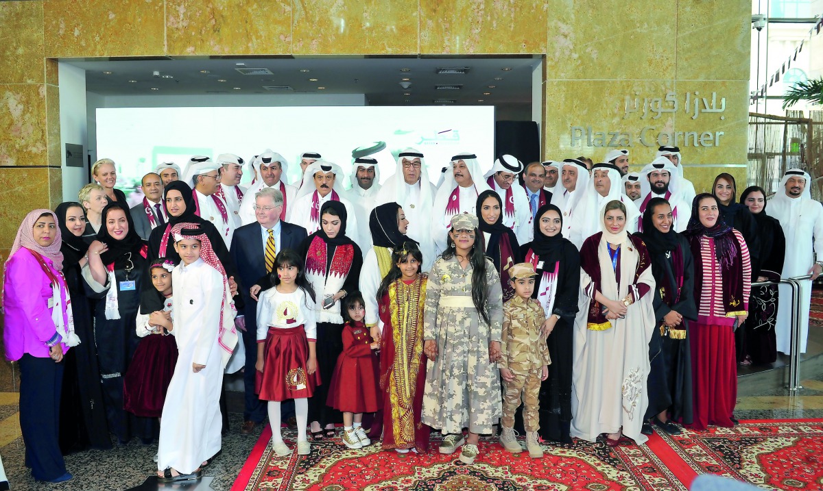 Commercial Bank Chairman Sheikh Abdulla bin Ali bin Jabor Al Thani; Vice-Chairman Hussain Ibrahim Al Fardan; Managing Director Omar Al Fardan; and Group CEO Joseph Abraham with other members of Board of Directors and the staff and their children at the Qa