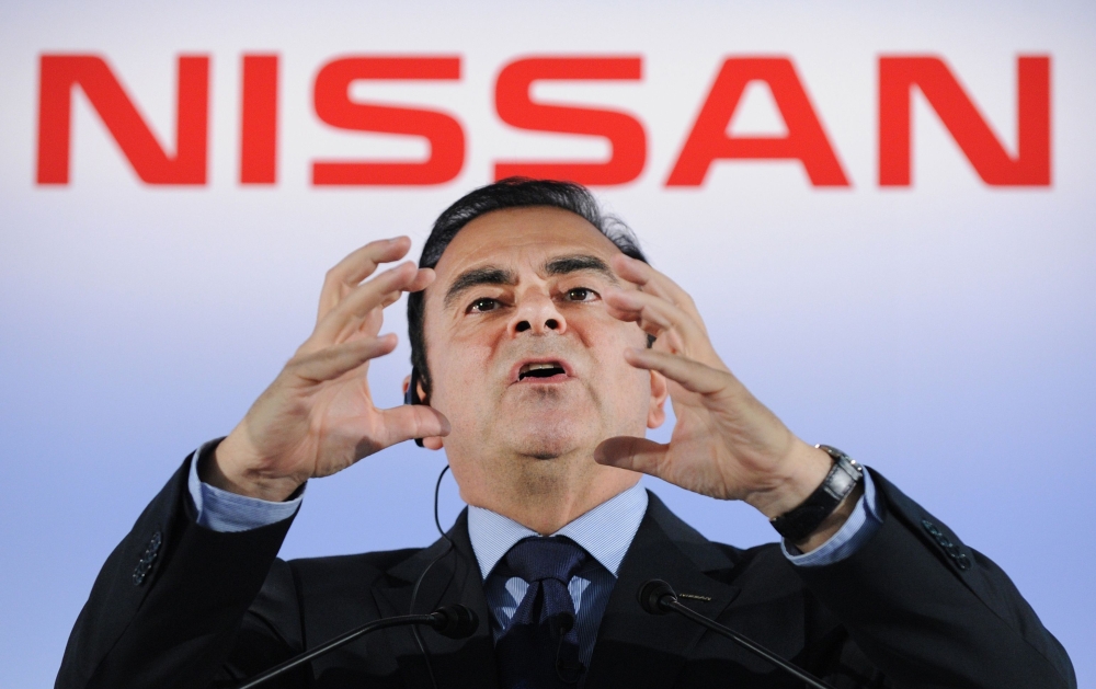  In this file photo taken on May 11, 2012, President and CEO of Japan's auto giant Nissan Carlos Ghosn gestures as he answers questions during a press conference at the headquarters in Yokohama, suburban Tokyo. / AFP / Toru YAMANAKA