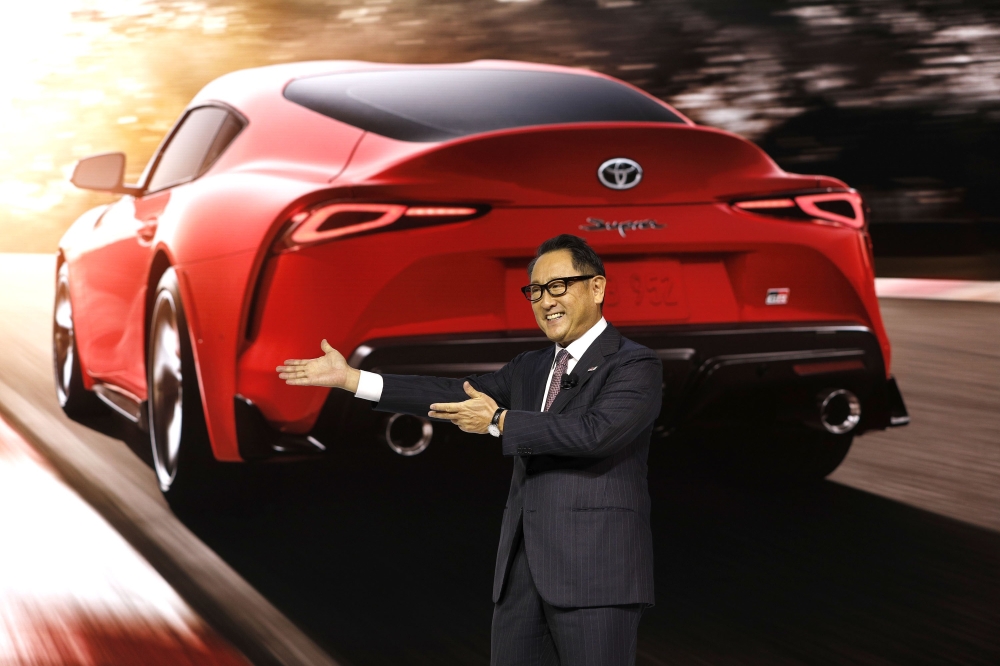 President of Toyota Motor Corporation,reveals The 2020 Toyota Supra rear-wheel-drive sports coupe at the 2019 North American International Auto Show during Media .Bill Pugliano/Getty Images/AFP .