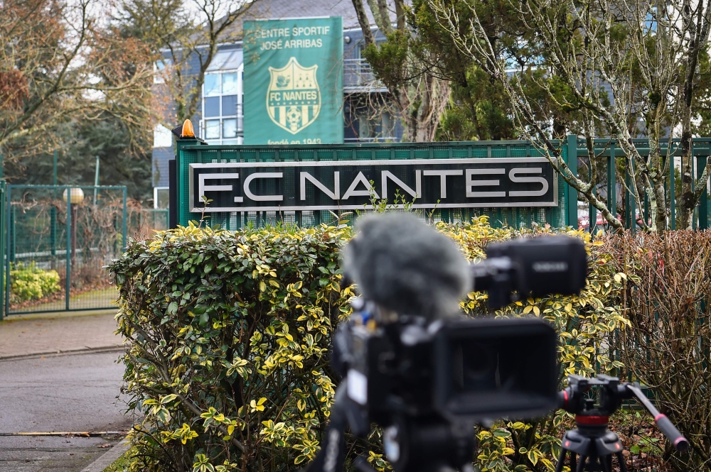 A picture shows a camera at the entrance of the FC Nantes training center of la Joneliere after the announcement of the vanishing of the plane carrying Argentinian forward Emiliano Sala from Nantes to Cardiff, on January 22, 2019 in La Chapelle-sur-Erdre,
