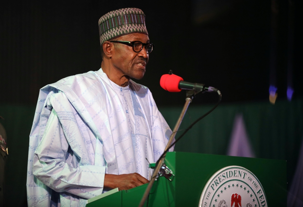 Nigeria's President Muhammadu Buhari speaks after collecting his certificate from the electoral commission following the poll win in Abuja, Nigeria February 27, 2019. REUTERS