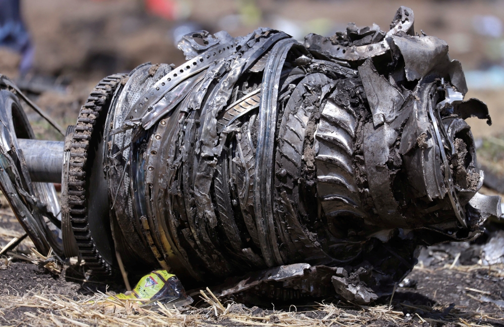 File photo of airplane engine parts are seen at the scene of the Ethiopian Airlines Flight ET 302 plane crash, near the town of Bishoftu, southeast of Addis Ababa, Ethiopia March 11, 2019. REUTERS/Tiksa Negeri/File Photo