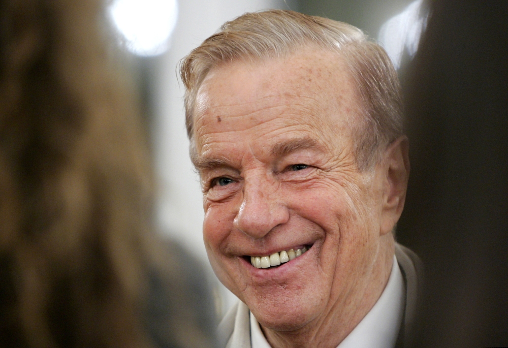 FILE PHOTO: Italy's film director Franco Zeffirelli smiles during a ceremony at the British Embassy in Rome November 24, 2004. REUTERS/Tony Gentile