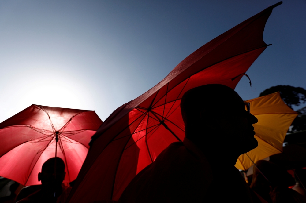 Monks gather at the Buddhist monks convention in Kandy, Sri Lanka on July 7, 2019. (REUTERS/Dinuka Liyanawatte)