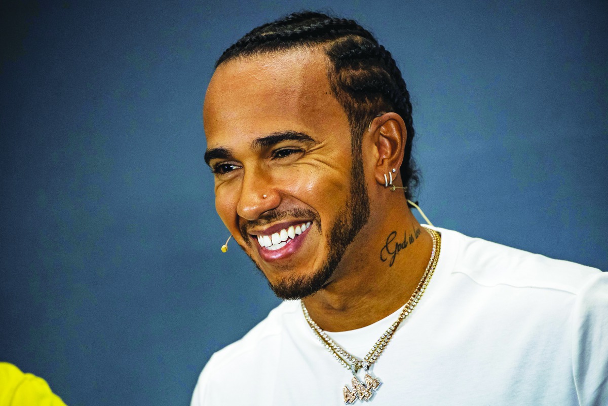 Mercedes' British driver Lewis Hamilton smiles during the drivers' press conference at Silverstone motor racing circuit in Silverstone, central England, on July 11, 2019 ahead of the British Formula One Grand Prix.  AFP / Andrej Isakovic
 