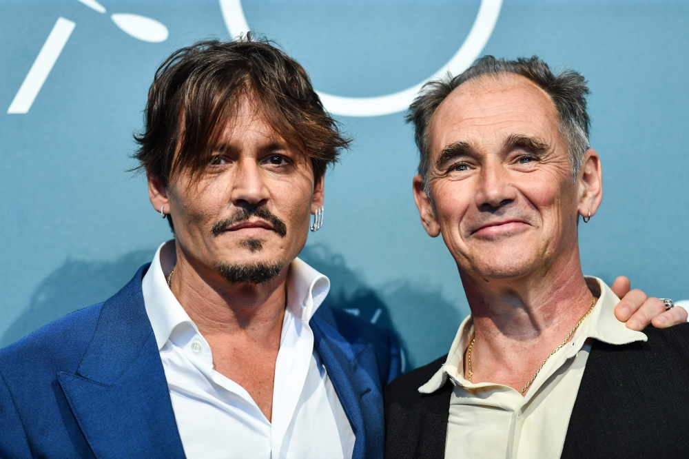 US actor Johnny Depp (L) and British actor Mark Rylance attend a photocall for the film