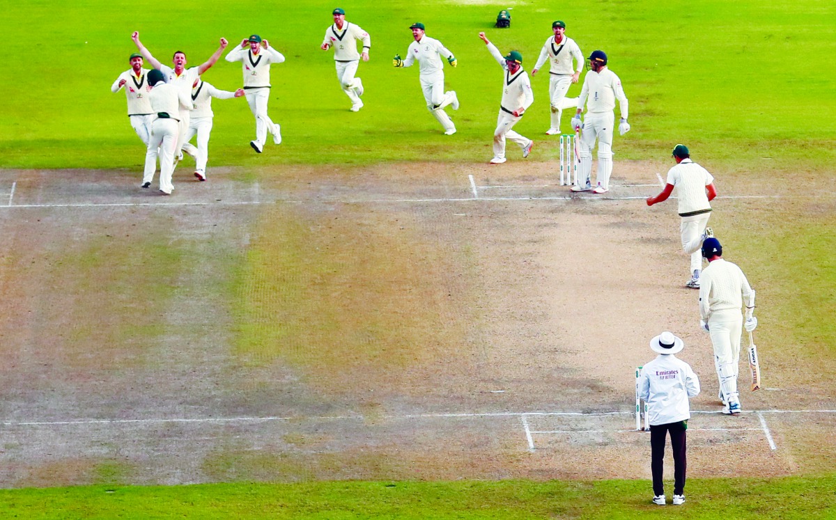 ustralia's Josh Hazlewood celebrates taking the wicket of England's Craig Overton with team mates to win the match and retain the Ashes Action Images via Reuters/Jason Cairnduff