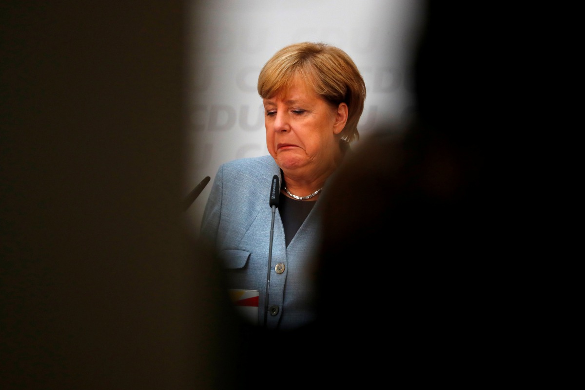 Angela Merkel reacts during a news conference at the CDU party headquarters a day after the general election in Berlin, September 25, 2017. Reuters/Fabrizio Bensch