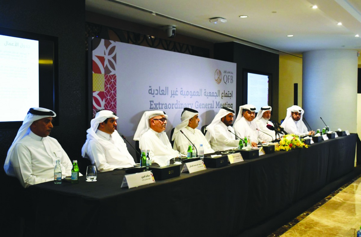 QFB Board members along with Chairman, Sheikh Faisal bin Thani Al Thani, and CEO Ali Mohammed Al Obaidli at the EGM.