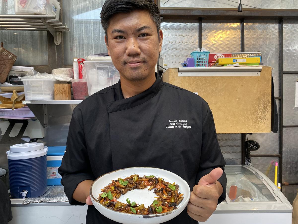 Thai chef Surasit Buttama holds a dish of organic insects at Insects in the Backyard, Bangkok, Thailand on October 25, 2019. Thomson Reuters Foundation/Nanchanok Wongsamuth