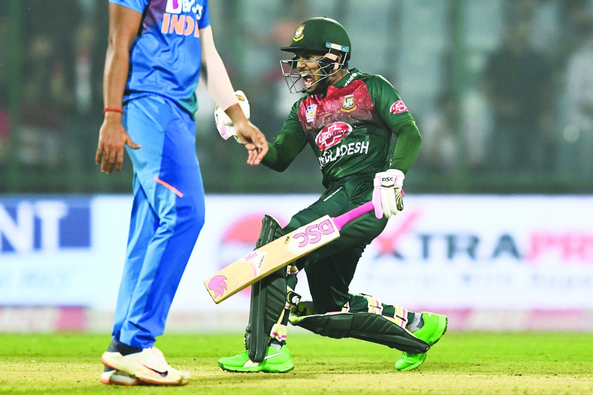 Bangladesh's Mushfiqur Rahim (R) celebrates his victory at the end of the first T20 international cricket match of a three-match series between Bangladesh and India, at Arun Jaitley Cricket Stadium in New Delhi on November 3, 2019. AFP / Jewel Samad 