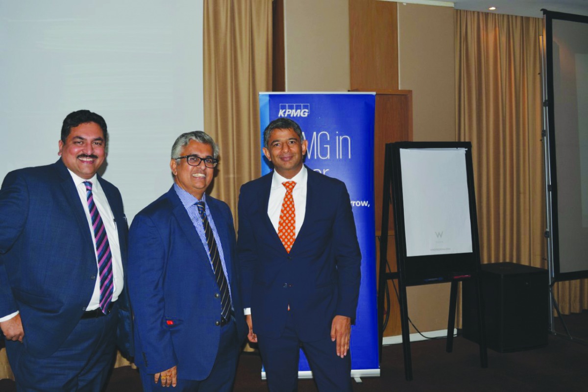 KPMG Qatar officials posing for a picture on the sidelines of the IFRS session held in Doha recently.