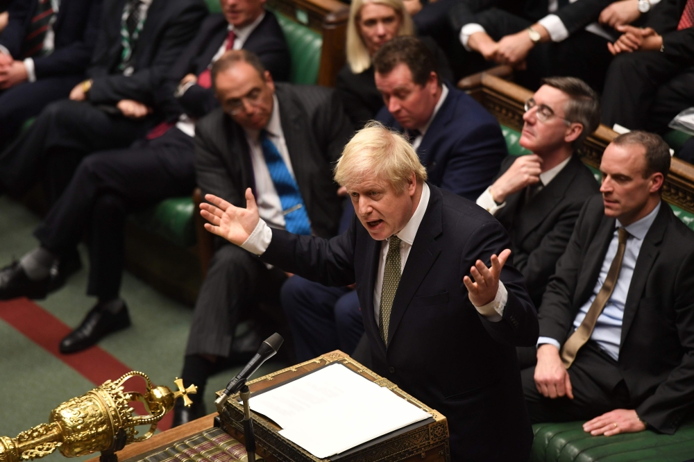 Britain's Prime Minister Boris Johnson speaking in the House of Commons in London after the State Opening Of Parliament. (AFP PHOTO / Jessica Taylor /UK Parliament