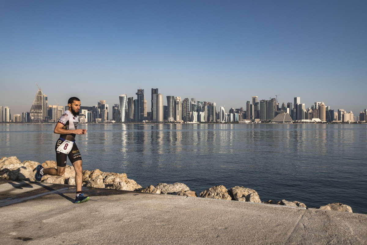 An athlete takes part in the Doha Triathlon in this file photo.