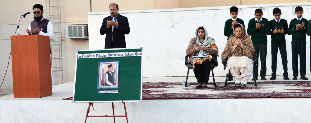 Pakistan International School staff and students offer prayers on passing of school’s founder, Lt. Gen. (R) Muhammad Jahan Zeb Arbab during the morning assembly.