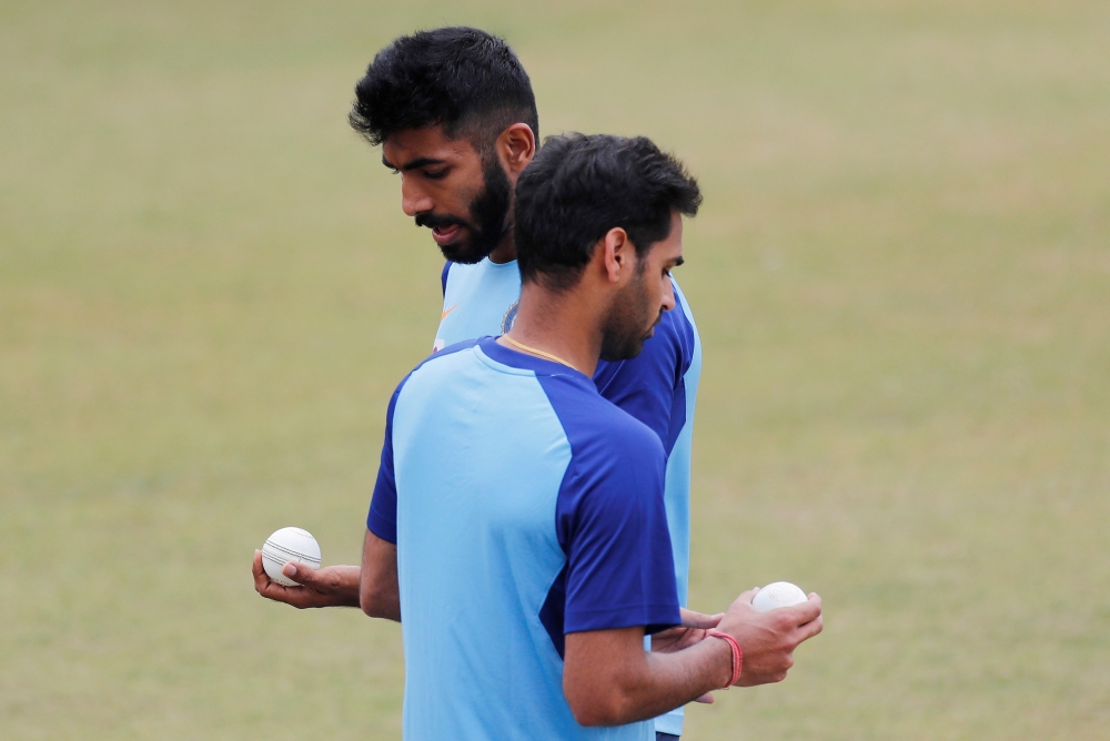  Cricket - India v South Africa - ODI Series - India Nets - Dharamsala, India - March 11, 2020 India's Bhuvneshwar Kumar and Jasprit Bumrah during nets REUTERS/Adnan Abidi 