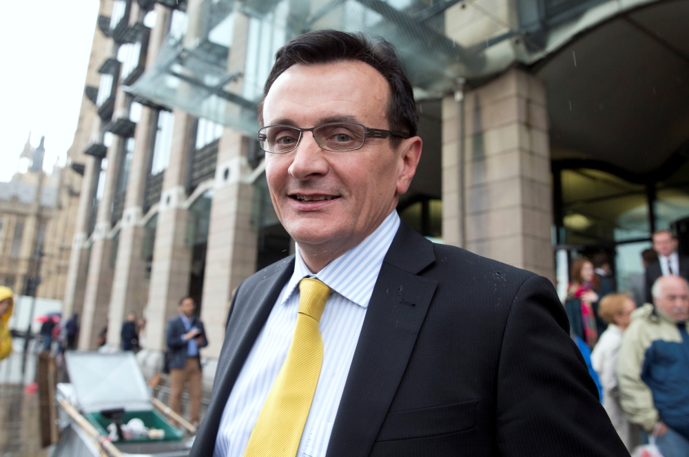 FILE PHOTO: Chief executive of AstraZeneca Pascal Soriot pictured after appearing at a parliamentary hearing in London, May 13, 2014. REUTERS/Neil Hall/File Photo