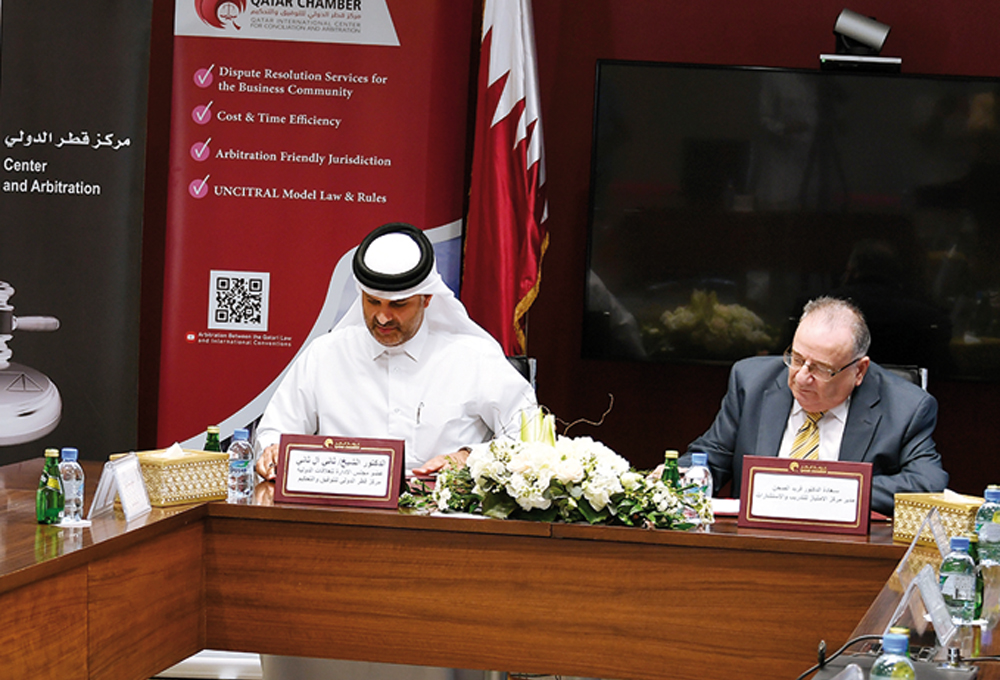 QICCA Board Member for International Relations, Dr Sheikh Thani bin Ali Al Thani (left), and Director of Excellence Center for Training and Consulting, Dr Farid Al Sahn, signing the agreement at a ceremony in Doha, recently.  
