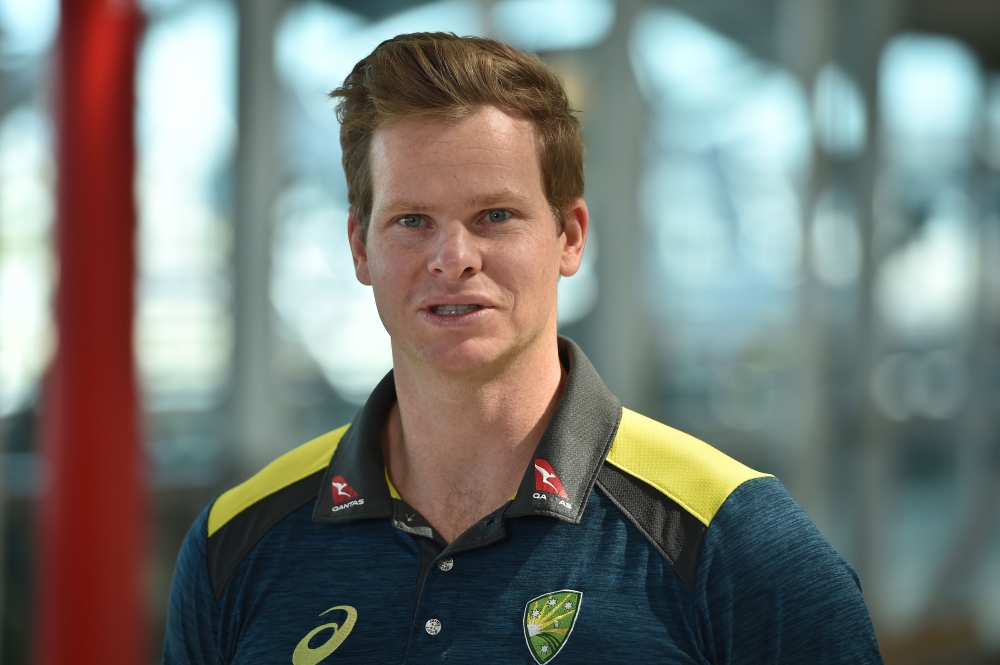 Australian cricketer Steve Smith talks to the media at Sydney airport on August 23, 2020. Australian coach Justin Langer said his Australia squad are super-fit and ready to hit the ground running ahead of departing for a white-ball tour of England, their 