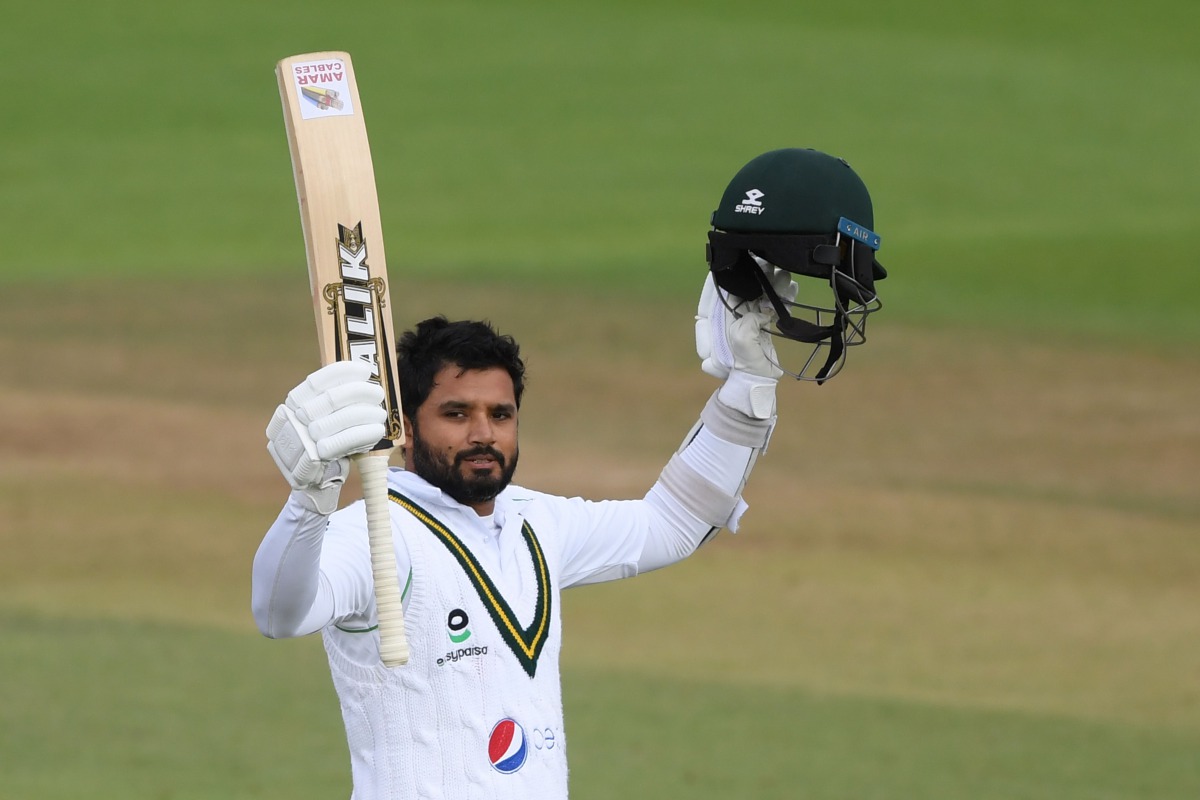 Pakistan's Azhar Ali celebrates after reaching his century on the third day of the third Test cricket match between England and Pakistan at the Ageas Bowl in Southampton, southern England on August 23, 2020