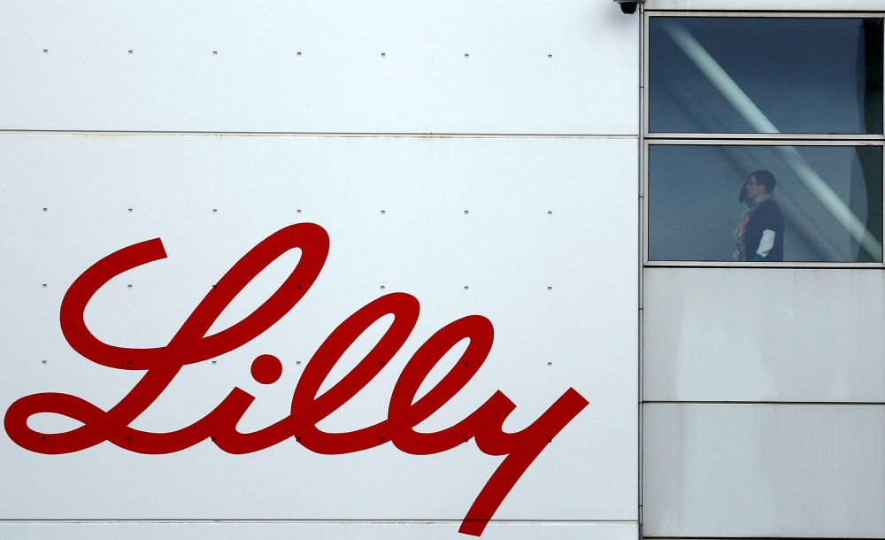 The logo of Lilly is seen on a wall of the Lilly France company unit, part of the Eli Lilly and Co drugmaker group, in Fegersheim near Strasbourg, France, February 1, 2018. 2018. REUTERS/Vincent Kessler/File Photo
