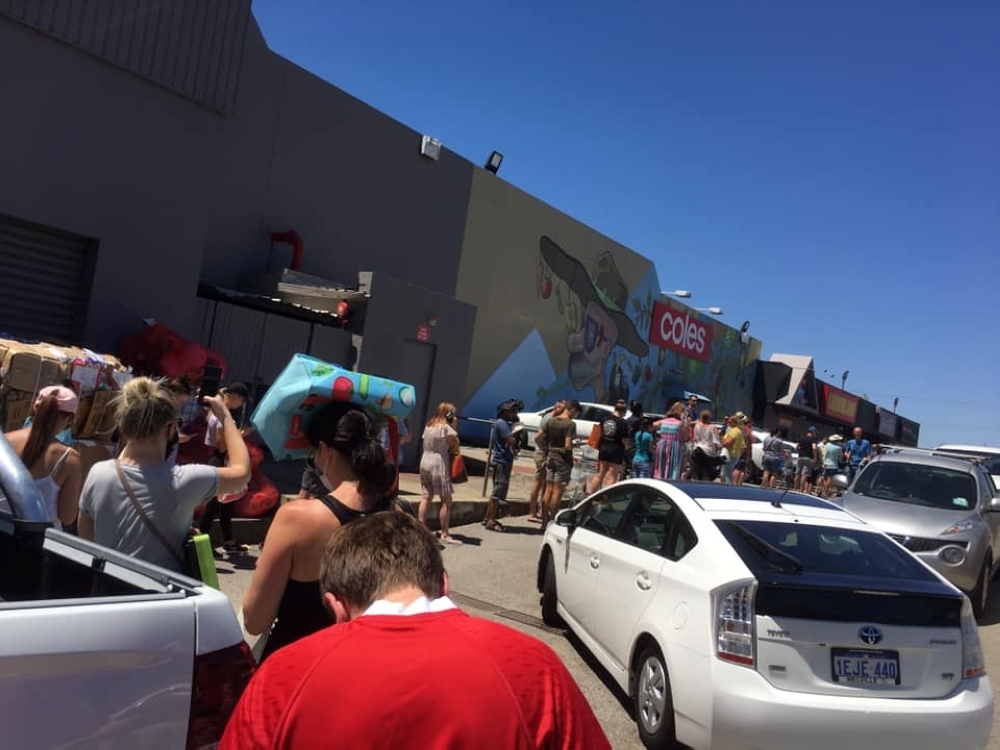 Shoppers line up outside Coles Supermarket during the COVID-19 pandemic in North Perth, Australia January 31, 2021 in this image obtained from social media. Twitch @Travisty_James via REUTERS