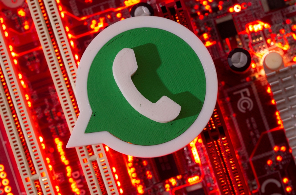 A 3D printed Whatsapp logo is placed on a computer motherboard in this illustration taken January 21, 2021. Reuters/Dado Ruvic/Illustration/File Photo