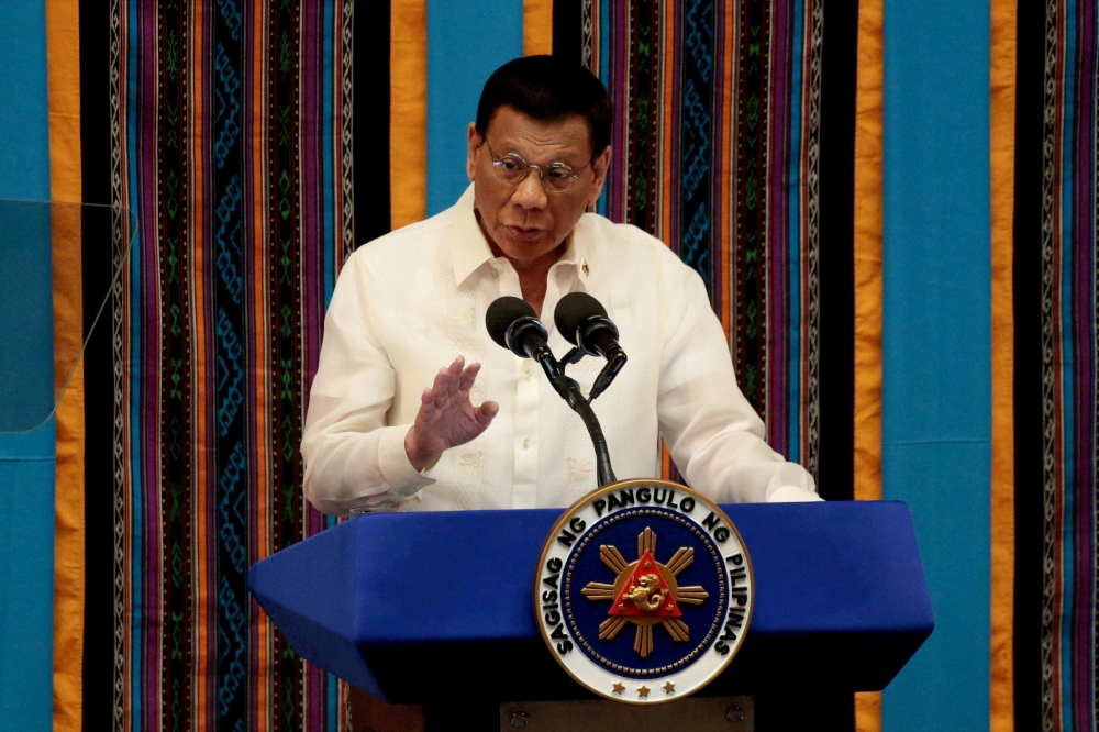 Philippine President Rodrigo Duterte gestures during his fourth State of the Nation address at the Philippine Congress in Quezon City, Metro Manila, Philippines, July 22, 2019. REUTERS/Eloisa Lopez/File Photo/File Photo