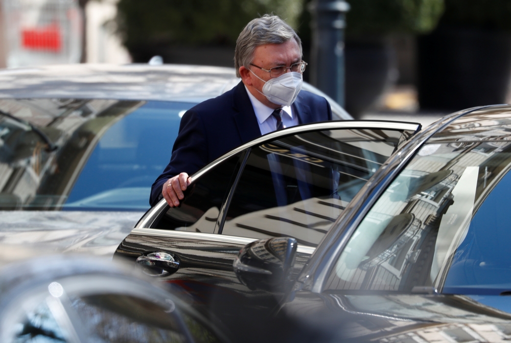 Russia's Governor to the International Atomic Energy Agency (IAEA), Mikhail Ulyanov, leaves at a meeting of the JCPOA Joint Commission, in Vienna, Austria, April 9, 2021. REUTERS/Leonhard Foeger
