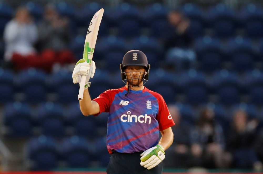 June 23, 2021 England's Jos Buttler celebrates reaching his half century Action Images via Reuters/Andrew Boyers/File Photo