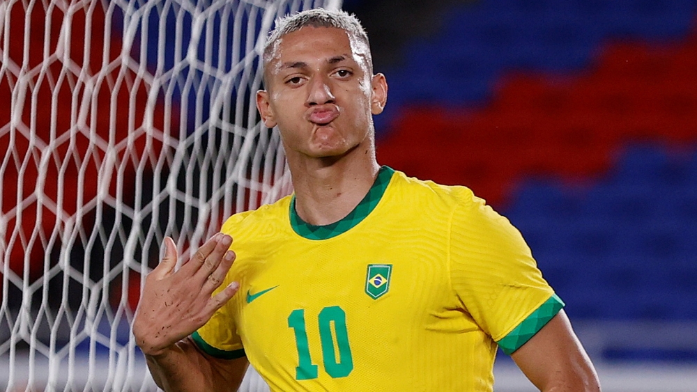 Richarlison of Brazil celebrates scoring their third goal and completing his hat-trick REUTERS/Phil Noble