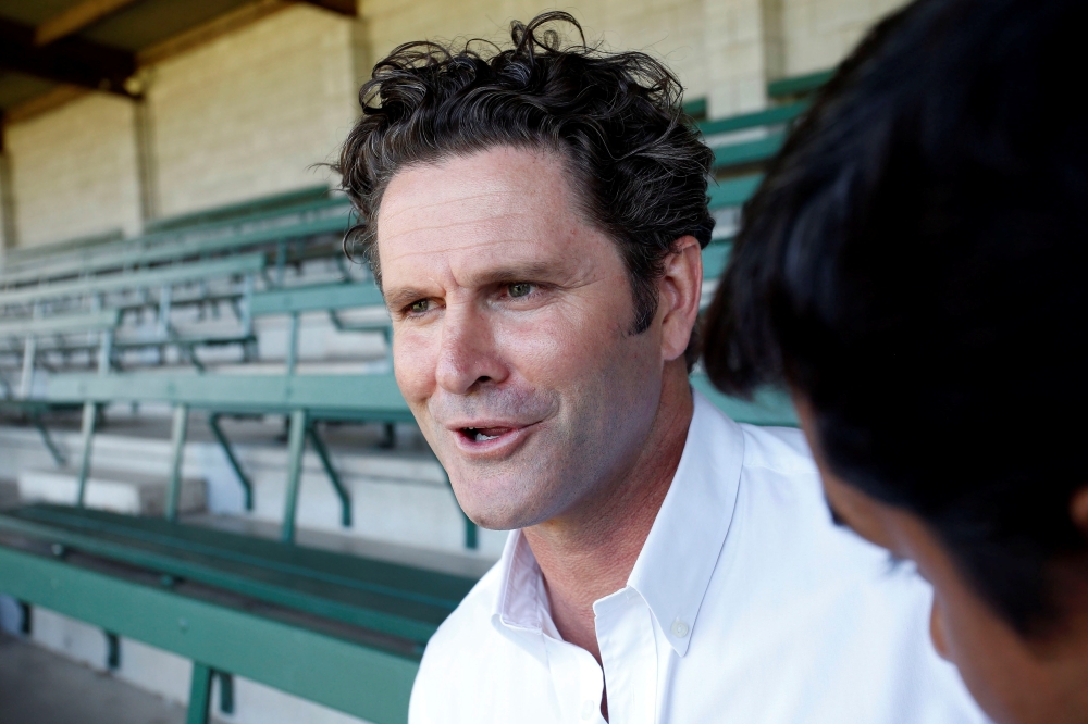 Former New Zealand cricketer Chris Cairns gives a news conference on day four of the first international test cricket match against New Zealand, at Eden Park in Auckland, February 9, 2014. REUTERS/Nigel Marple