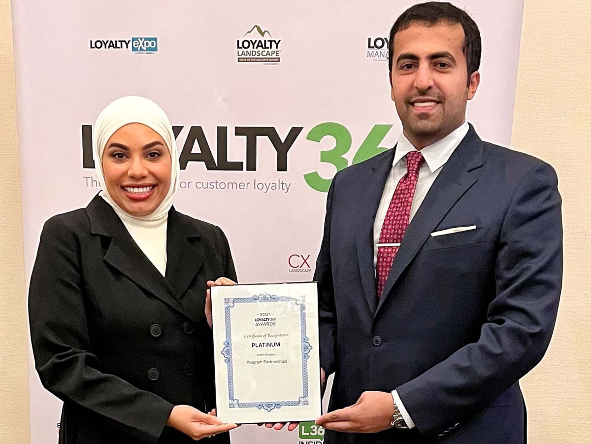 Sabah Rabiah Al Kuwari (right), Director  of Public Relation, and Mayasa Alhejazi, Acting Assistant Director, Loyalty, receiving the award.
