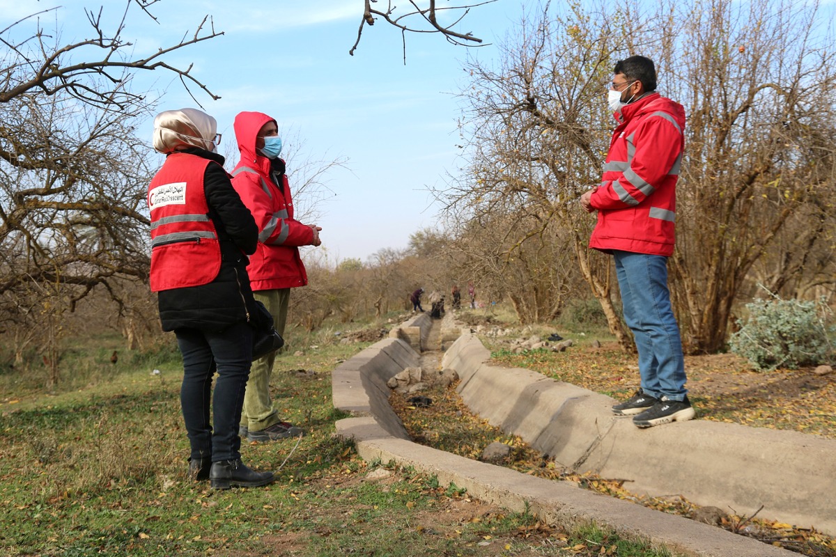 QRCS representatives at an irrigation rehabilitation network site. 