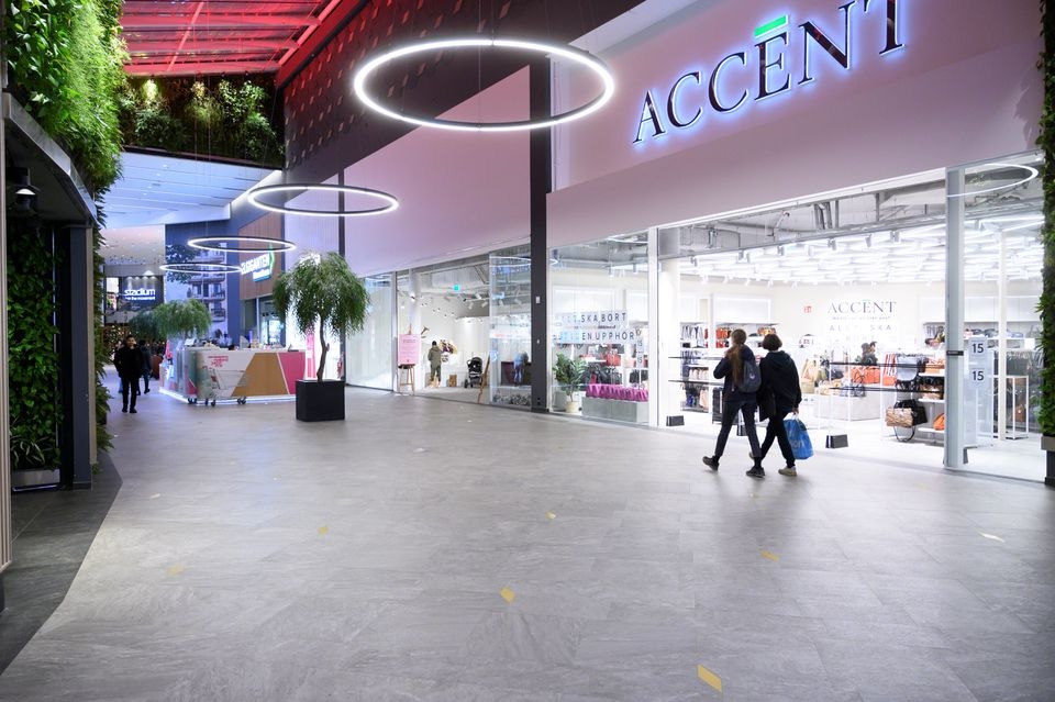 People walk at the Granbystaden shopping center, as the government announced new recommendations and restrictions to curb the spread of the coronavirus disease (COVID-19) pandemic, in Uppsala, Sweden, December 18, 2020. TT News Agency/Henrik Montgomery via REUTERS


