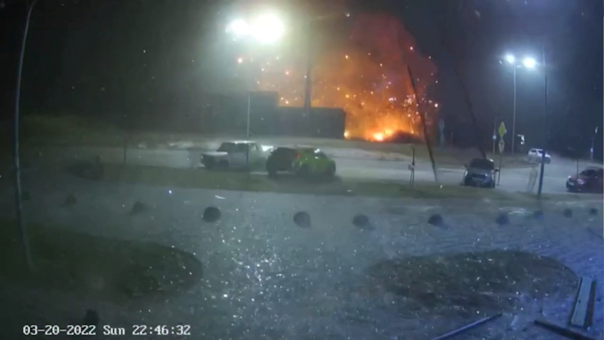 Fire burns after a blast hits a shopping centre, in Kyiv, Ukraine, in this still image obtained from a handout video released on March 20, 2022. State Emergency Service of Ukraine/Handout via REUTERS 