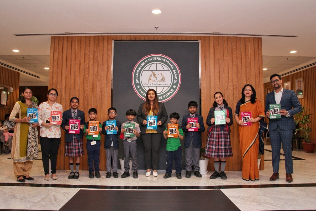 School officials with students at the programme. 
