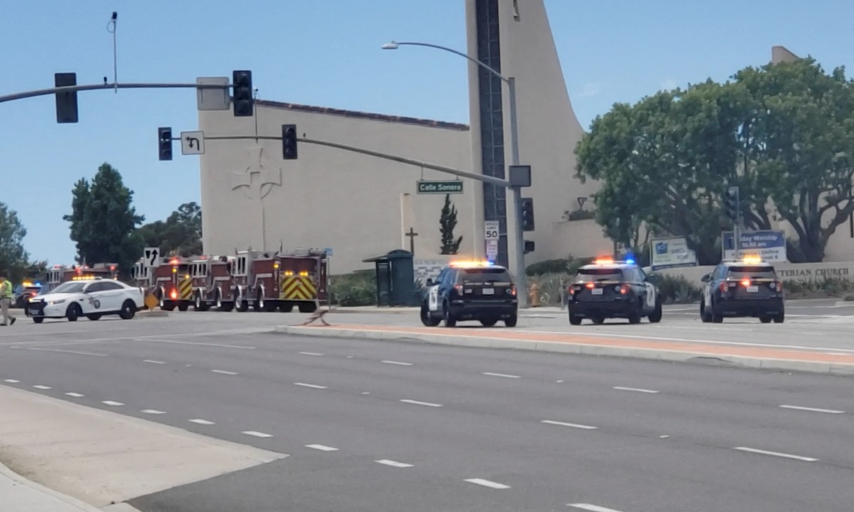 Emergency personnel respond at the scene of a shooting outside a church in Laguna Woods, California, U.S., in this still image from a social media video, May 15, 2022. Courtesy of Alana Geiger/ via REUTERS